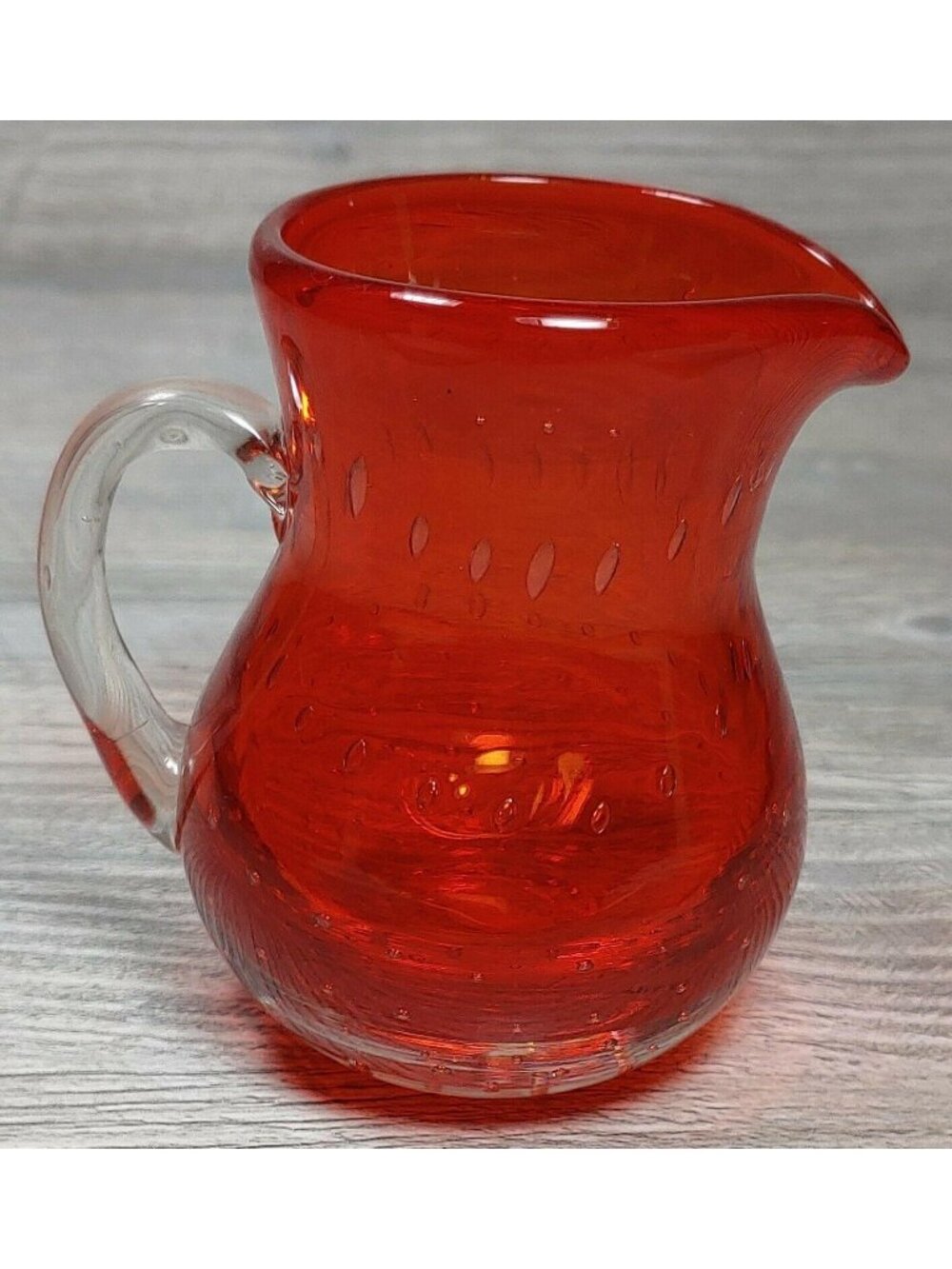 Vintage Hand Blown Red Glass Pitcher With Clear Handle Textured Bubble Design